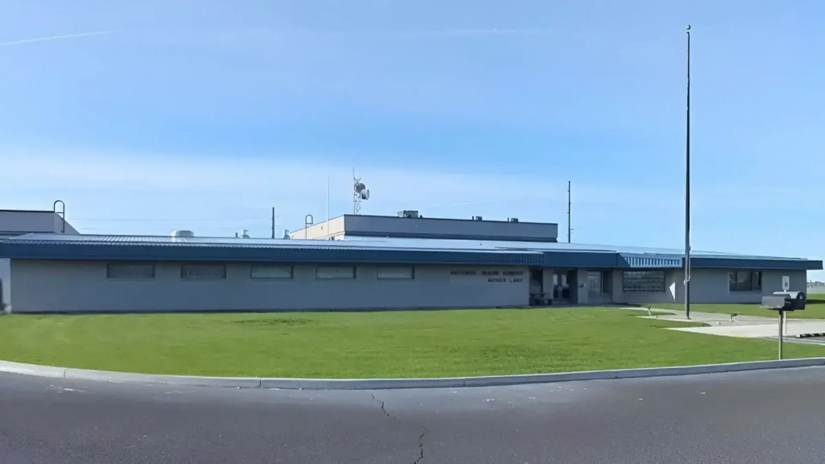 Modern military facility at Moses Lake with clear blue sky.